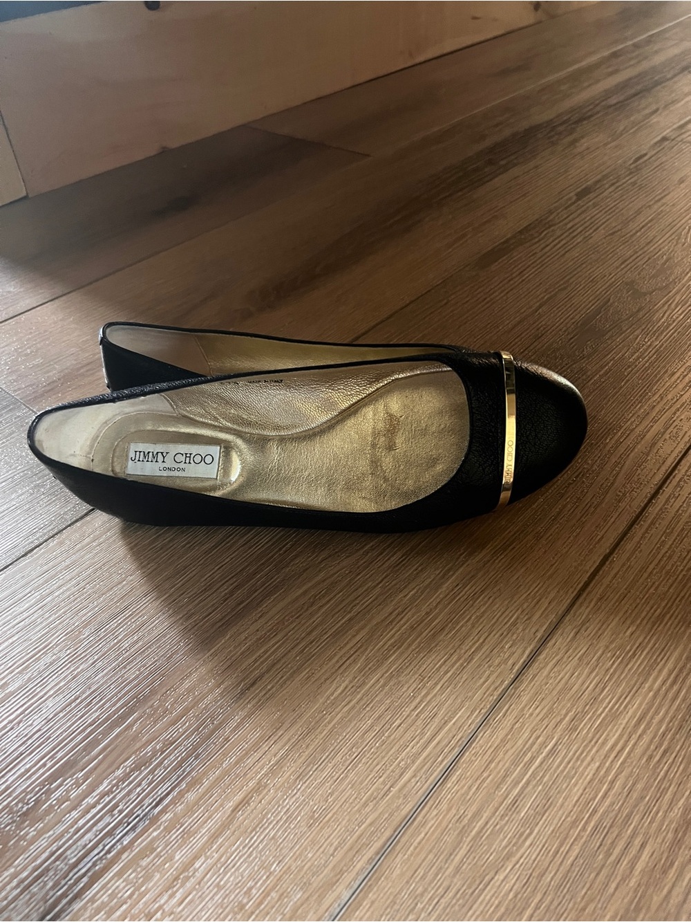 Authentic Jimmy Choo Black Leather Ballet Flat with Gold Accent